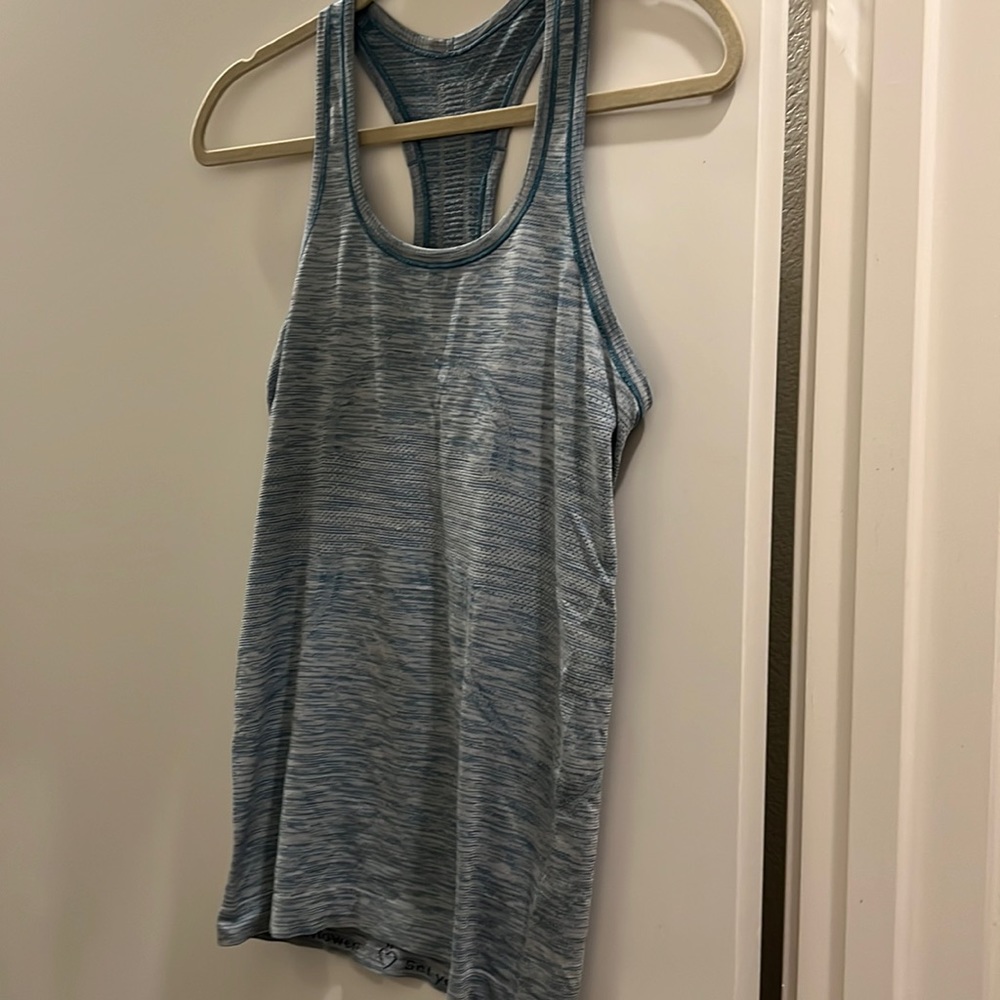 Lululemon swiftly speed racerback. Size 6, heather blue